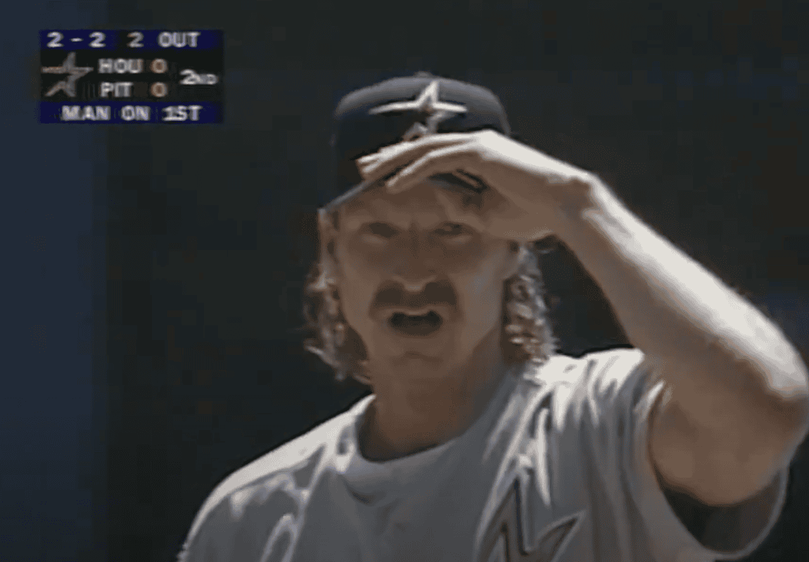 Randy Johnson pitching for the Astros, showcasing his dominance post-trade.